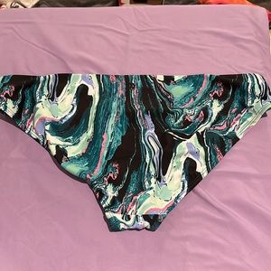 All in motion. Multi colored swim bottoms. Add some color.